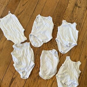 Bundle of 6 white sleeveless baby onesies 3-6 months